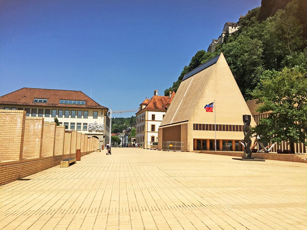 Hot day in cute Vaduz, Liechtenstein, surrounded by gorgeous Alps